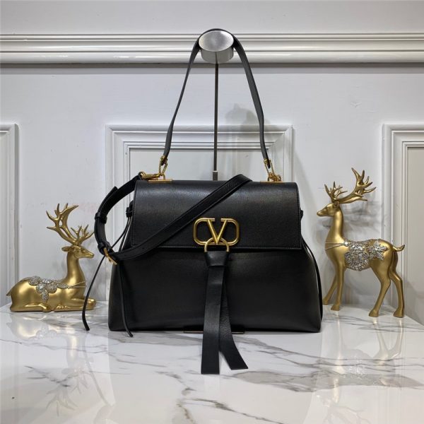 Fake Valentino Garavani VRING small leather shoulder bag in Black