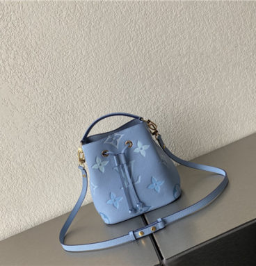 lv by the pool bucket bag