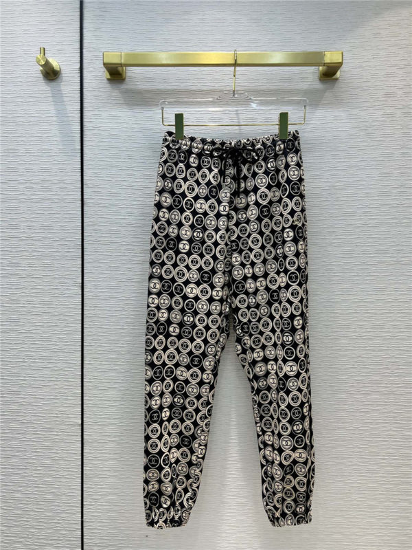 chanel coin print track pants