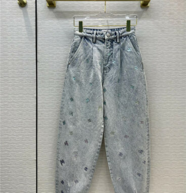 chanel silver filigree logo jeans