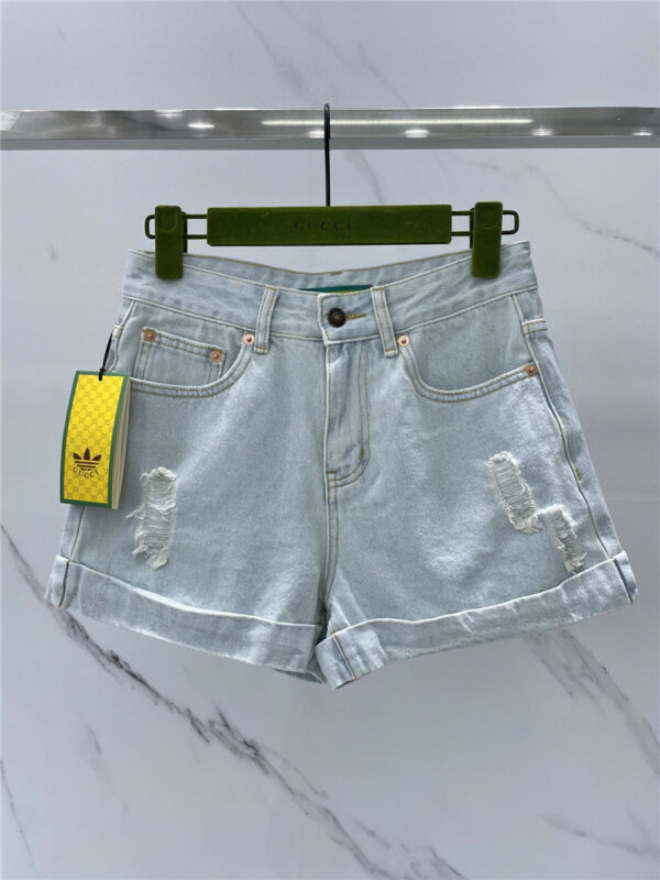 gucci logo embroidered ripped denim shorts