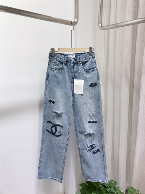Chanel distressed blue jeans