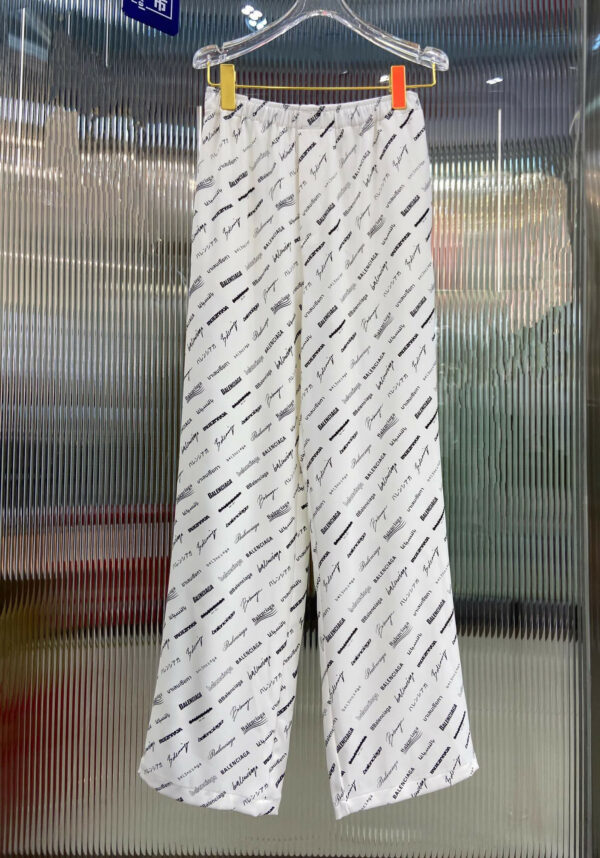 Balenciaga all over logo print trim casual trousers