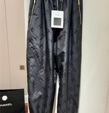 Chanel black logo print trousers