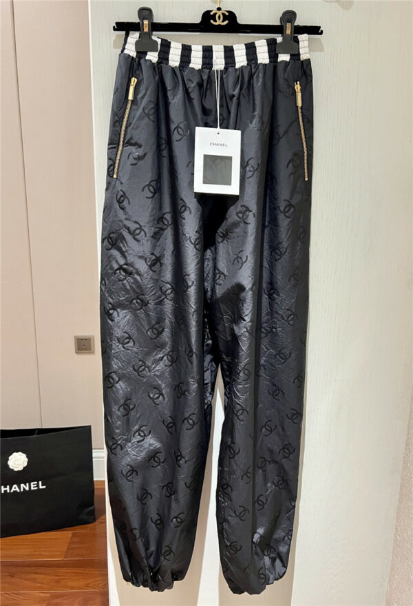 Chanel black logo print trousers