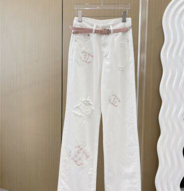 chanel ripped sequined jeans
