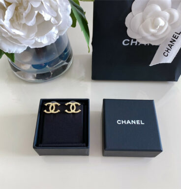 Chanel embossed double C earrings