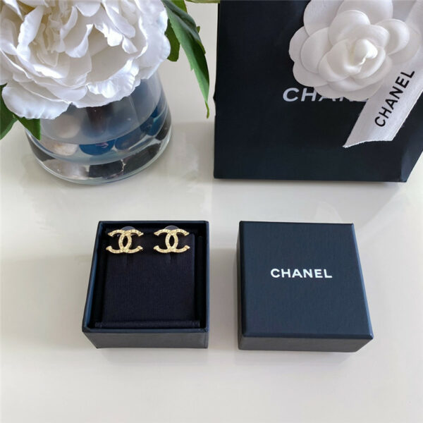 Chanel embossed double C earrings