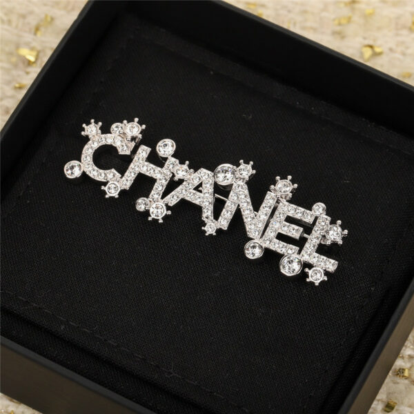 chanel letter crystal brooch
