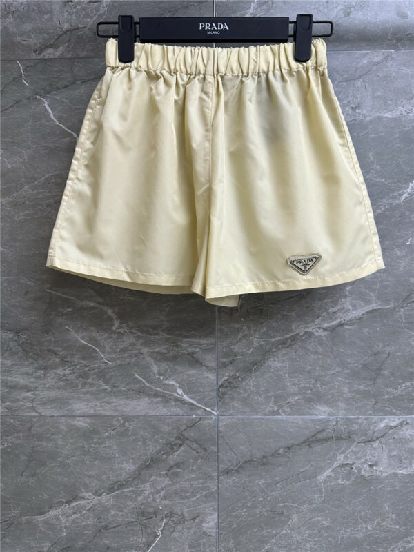 prada triangle logo nylon shorts