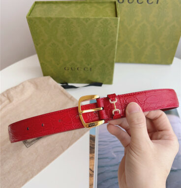 gucci print embossed leather belt