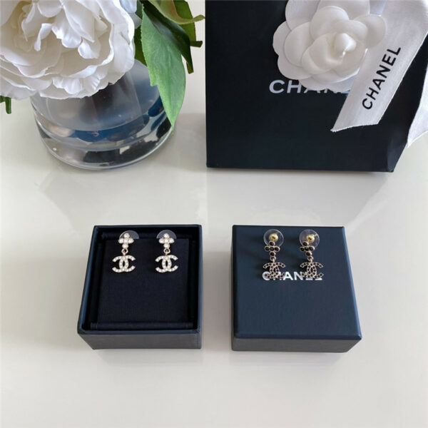 Chanel cross crystal pendant double C earrings