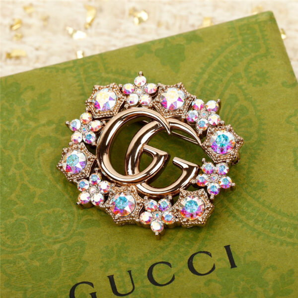 gucci double G brooch