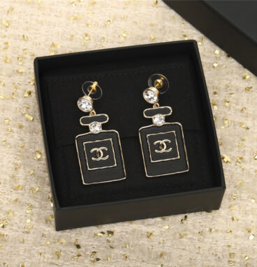 Chanel black gold perfume bottle earrings