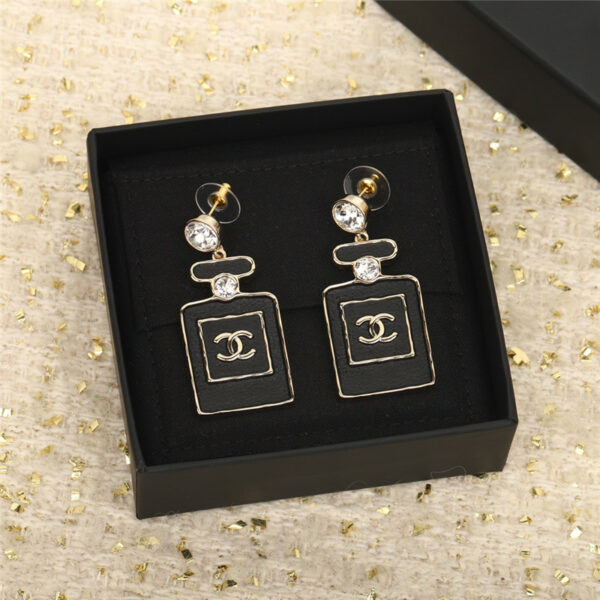 Chanel black gold perfume bottle earrings