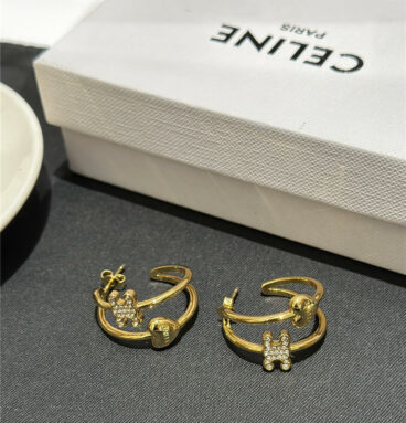 celine Arc de Triomphe gold heart earrings