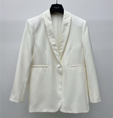 the row cream white suit