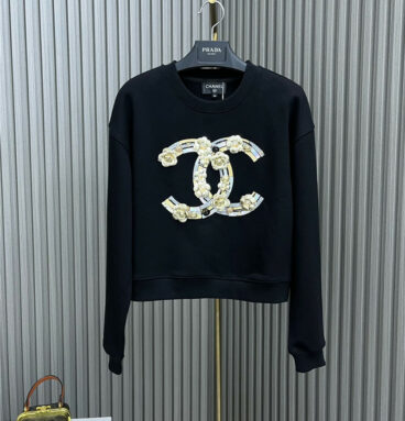 chanel heavy industry camellia round neck sweater