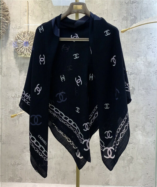 chanel chain with characteristic double C square scarf