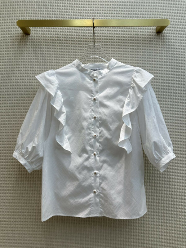 chanel palace style ruffled shirt
