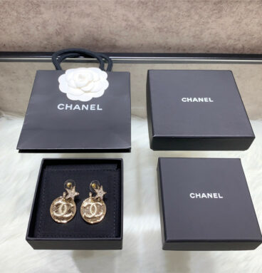 chanel gold coin star earrings