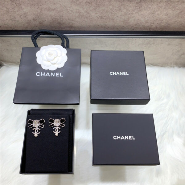 chanel bow hanging double c beads earrings