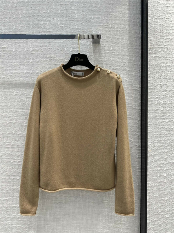 dior pearl button rolled hem sweater