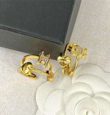 celine love arc de triomphe gold curved earrings