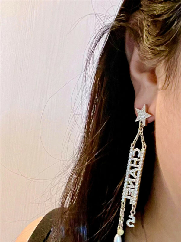 chanel five-pointed star + double C tassel ear clip