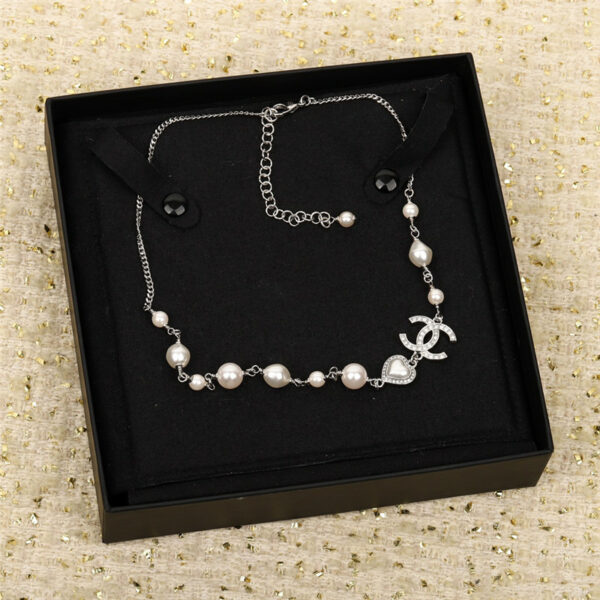 chanel silver love double c necklace