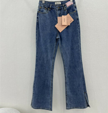 miumiu waistband letter patch logo embellished jeans