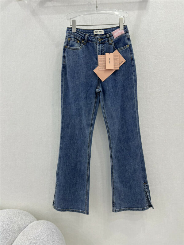 miumiu waistband letter patch logo embellished jeans
