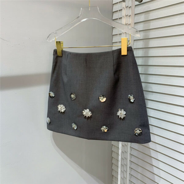 miumiu heavy industry studded flower skirt