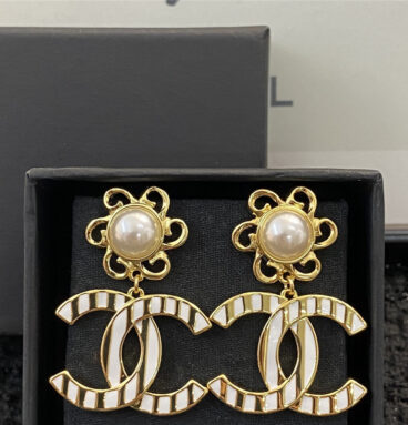 chanel sunflower white gold double c pendant earrings