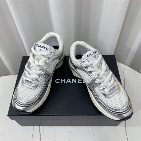 chanel gold and silver horn king sneakers