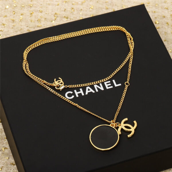 chanel black circle spelled double c necklace