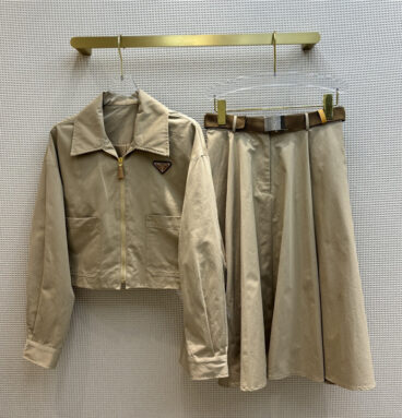 prada short jacket + belt skirt suit