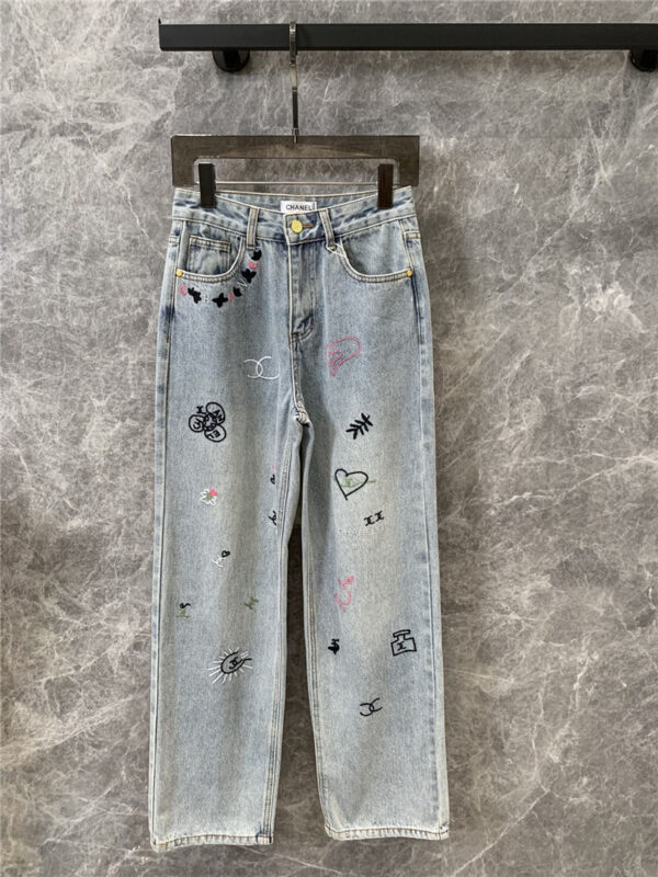 chanel multi-LOGO embroidered denim trousers