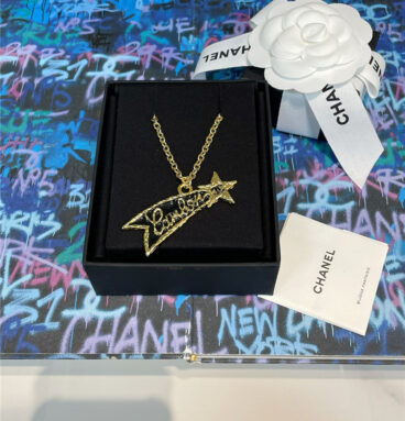 chanel black gold letter lava star necklace