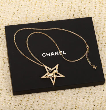 Chanel roller skate pentagram necklace