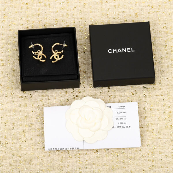 Chanel embossed double c earrings