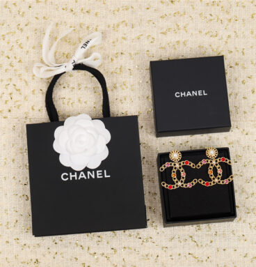 Chanel double c colored diamond earrings